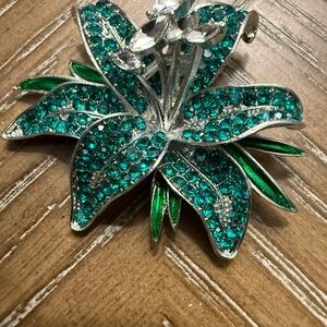 Elegant Silver and Green Floral Brooch